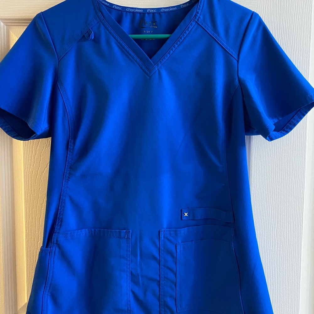 Royal blue Cherokee Flex scrub top. size S.